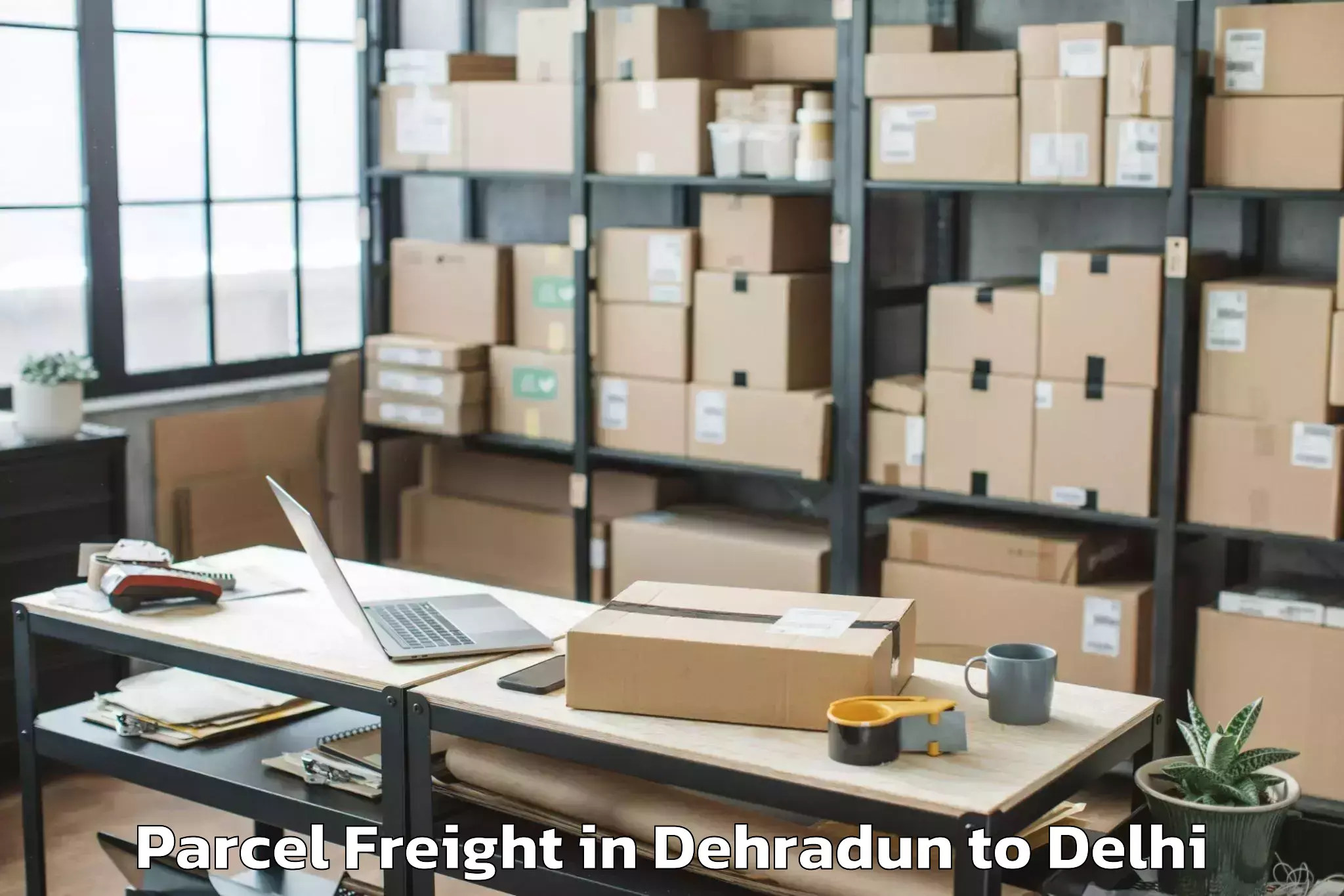 Top Dehradun to Indira Gandhi International Ai Parcel Freight Available